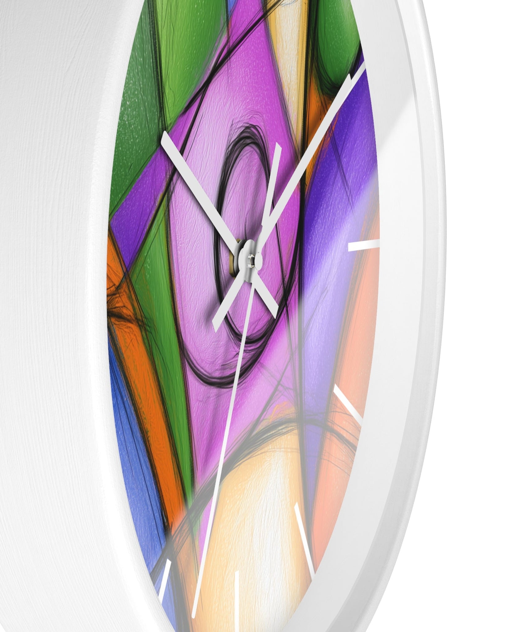 A close-up of a round wall clock with a white frame and a colorful abstract face featuring purple, green, blue, orange, and cream shapes with black hand-drawn lines and white hour markers.